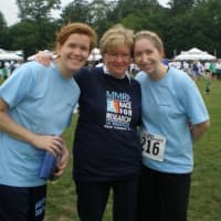 <p>Megan Parker, right, and her sister, Elizabeth, left, stand with their mother, Joan, after a race in 2010. Joan Parker died after a bout with Multiple Myeloma later that year.</p>