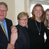 <p>Megan Parker, who will run the TCS New York City Marathon for the Multiple Myeloma Research Foundation, stands with (from left) her father, Jeff; mother Joan; and sister, Elizabeth, at a family event in 2010. Megan will run the NYC Marathon Sunday.</p>