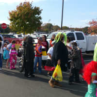 <p>Kids enjoy the trunk-or-treating at Fairfield Warde. </p>