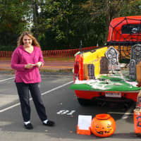 <p>April Wilk turned her 1948 Ford Coe into a mini graveyard for Saturday&#x27;s event.</p>
