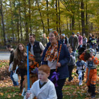 <p>Halloween parade marchers in Somers proceed from Route 100 to Bailey Park</p>