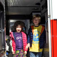 <p>Kids were able to tour fire trucks and take photos. </p>