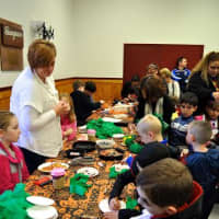 <p>Children participate in indoor arts and crafts activities. </p>