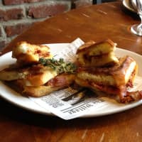 <p>Grilled cheese slider: brioche, applewood smoked bacon, cheddar and smoked tomato jam</p>