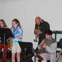 <p>Trumpeter Dave Guy plays with the students at Danbury&#x27;s Wooster School.</p>