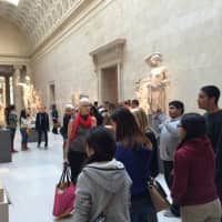 <p>Teens tour the museum and view exhibits made of clay. </p>