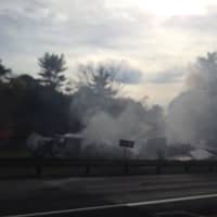 <p>The Greenwich Fire Department is putting out the truck fire on the Merritt Parkway.</p>
