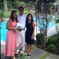 <p>Julie Vanderblue and Christine Magliocco of the Vanderblue Team at Higgins Group meet the owner of 1 Hubbell Lane in Fairfield, interior designer Ron Marshall.</p>