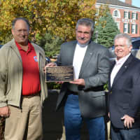 <p>From left, Steven Delzio, Arnold Guyot and Somers Supervisor Rick Morrissey at the dedication of the historic water trough.</p>