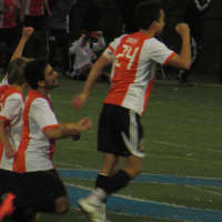 <p>Tigers jump for joy after Alex Alma scored the third penalty kick. </p>