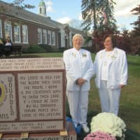 <p>Renate DeAngelis and Vivian Allen, members of the Gold Star Mothers Club, at the memorial.</p>