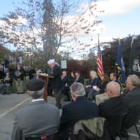 <p>William Nazaro speaking at an unveiling of a memorial honoring Purple Heart recipients. </p>