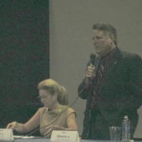 <p>MaryEllen Odell and Sam Oliverio at a debate for county executive in Carmel.</p>