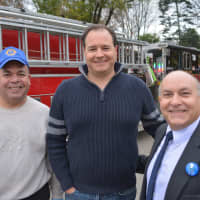 <p>Left to right: Bedford Village Lions Club President George Fernandez, parade Chair Mark Boyland and Bedford Supervisor Chris Burdick. The three pose for a picture following the parade.</p>