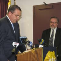 <p>Westchester County Police Commissioner George N. Longworth, left, and Pleasantville Mayor Peter Scherer at a Saturday news conference in Hawthorne.</p>