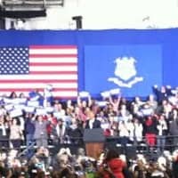 <p>President Barack Obama takes the stage at the far end of the gym at Bridgeport&#x27;s Central High School. </p>
