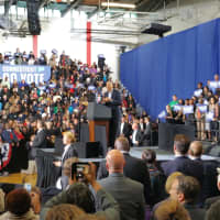 <p>President Barack Obama addresses a crowd of loud and excited supporters.</p>