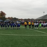 <p>Wilton and Westport players show pre-game unity.</p>
