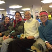 <p>Margaret Salmore of Ridgefield waits with friends after Sunday&#x27;s race.</p>
