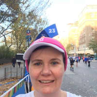 <p>Norwalk&#x27;s Amanda Connell closes in on the finish line as she passes the 23 mile mark at the TCS New York City Marathon on Sunday. </p>