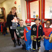 <p>Students are lined up and prepare to march in Buchanan-Verplanck Elementary Schools Halloween Parade.</p>