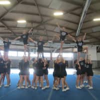 <p>The Hendrick Hudson cheerleading squad practicing its pyramid. </p>
