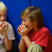 <p>Todd Elementary kindergarten students celebrate the fall season with the Big Apple Crunch. </p>