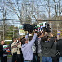 <p>Gov. Andrew Cuomo is surrounded after he approaches a crowd outside of his New Castle polling place.</p>