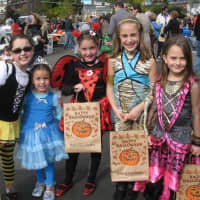<p>Children gathered for the Eastchester Raggamuffin parade and were provided candy and special giveaways. </p>