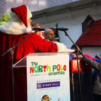 <p>DreamWorks Animation President and CEO Jeffrey Katzenberg, Forest City Ratner Executive VP Kathryn Welch, Yonkers Deputy Mayor Sue Gerry, Shrek, Santa Claus, and preschoolers from the Boys &amp; Girls Club of Northern Westchester push the magic button.</p>