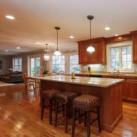 <p>The gourmet kitchen includes a center island.</p>