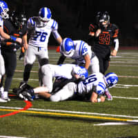 <p>Haldane players converge over a Tuckahoe ball carrier in the Class D title game Saturday at Mahopac.</p>