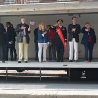 <p>Stamford Mayor David Martin, Town Clerk Donna Loglisci and Grand Marshal Richard Ursone cheer for the parade&#x27;s participants.</p>