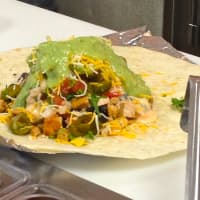 <p>A burrito in the making at Tijuana Mexican Grill in Sleepy Hollow </p>