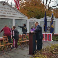 <p>Parents made it to the Wall of Honor early Tuesday, to show their children the names of relatives who have served in foreign wars.</p>