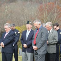 <p>Somers officials pause during the Veterans Day ceremony.</p>