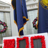 <p>The Wall of Honor is decked out with flowers for Veterans Day. </p>
