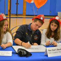 <p>The teammates of &quot;You Can&#x27;t Beat The Heat&quot; at Horace Greeley High School&#x27;s spelling bee.</p>