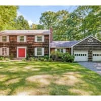 <p>This house at 32 Ravenwood Drive in Weston is open for viewing on Sunday.</p>