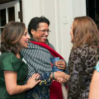 <p>Shirley Acevedo Buontempo, left, and Amy Peck, Latino U board member, right, welcome Iris Pagan, executive director of the Westchester County Youth Bureau.</p>