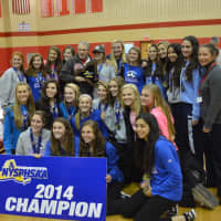 <p>Somers High School&#x27;s varsity girls soccer team celebrates its state championship victory.</p>