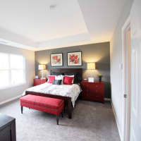 <p>A view of a master bedroom at Ridgeview Commons</p>