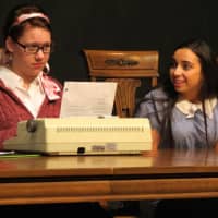 <p>John Jay High School junior Ellie Fritsch and sophomore Jenny Sokol act in separate scenes, both set in a dining room.</p>