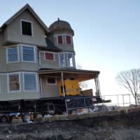 <p>The Kemper-Gunn House on Church Lane was lifted from its foundation and moved across the street to town-owned property, where it will be used as a business incubator. </p>