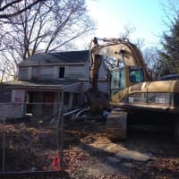 <p>This blighted property on Clifton Place was demolished Wednesday to make way for a future home for a family with a special needs child. </p>