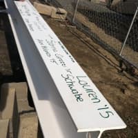 <p>Signatures on the ceremonial last beam at the &quot;topping off&quot; ceremony at Convent of the Sacred Heart on Thursday.</p>