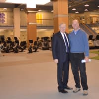 <p>David Tewksbury, right, President of Chelsea Piers Connecticut, shows the new club to Stamford Mayor David Martin.</p>