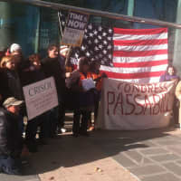 <p>Immigration activists gathered Friday, Nov. 21, in front of the Government Center to celebrate President Barack Obama&#x27;s recent executive order.</p>