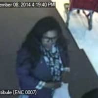 <p>One of the suspects in the theft of credit cards in Darien, seen on surveillance footage from the Target in Stamford.</p>