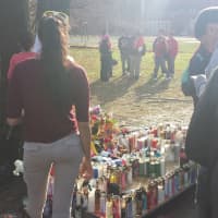 <p>Students and friends visiting the site of Joey Touri&#x27;s fatal crash on Monday afternoon near Port Chester High School.</p>
